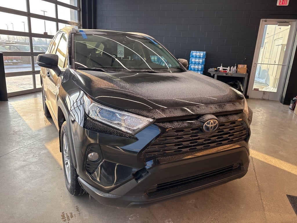 Used 2021 Toyota RAV4 XLE with VIN JTMRWRFV8MD127204 for sale in Northfield, Minnesota